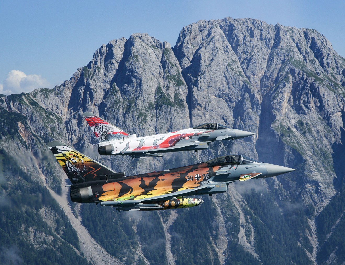 A “Bavarian Tiger” from 74 Tactical Air  Wing, Neuburg/Donau  together with the  “Austrian Tiger” from  Zeltweg over the Alps
